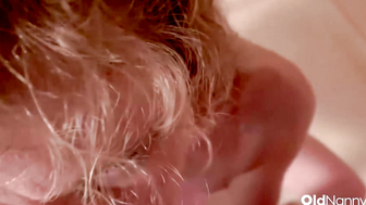 Curly Blonde MILF Strips And Gives Wet Shower Blowjob