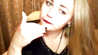 Hand into her mouth