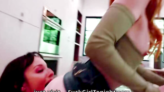 Brunette in Pink Top Gives Redhead a Blowjob on the Couch