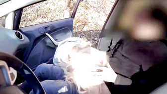 Blonde Woman Unzips Man's Jeans in Car