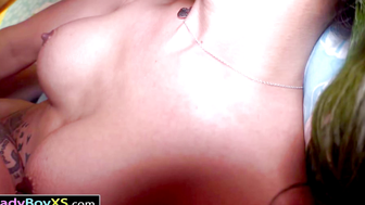 Ladyboy with Green Hair and Dragon Tattoo Pleasures Partner on Bed