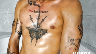 Tattooed Latino Boy Gets Intense Handjob in Wet Shower