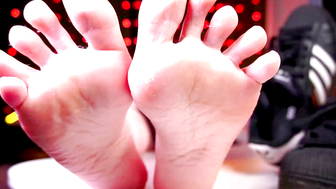 Barefoot Close Up Wiggling Toes on White Table with Red Lights