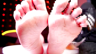 Barefoot Close Up Wiggling Toes on White Table with Red Lights