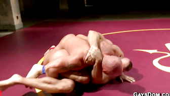 Muscled Hunk Jessie Deepthroats Cock in Naked Kombat Wrestling Match