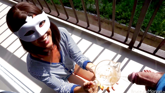 Masked Brunette Drinks Pitcher of piss on Balcony Outdoor Scene