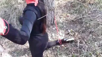 Bound to a tree  masked and outside tied deep throat