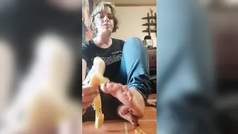 Bite porn video – Peels a Banana with her Feet and Takes a Gigantic Bite
