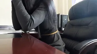 Inside the office a company employee caresses her cunt on