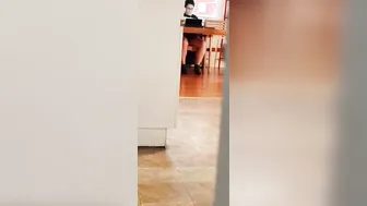 Spying vulgar cunt with mouth watching porn and masturbating under table
