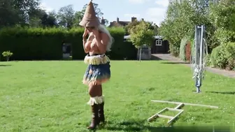 The gardener pounded the bird scarecrow realizing that this