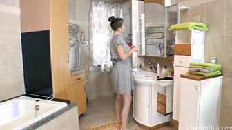 Bushy MILF Agneta into WC taking a shower her unshaved twat