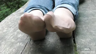 Jeans Foot inside Nylon Socks inside the Forest