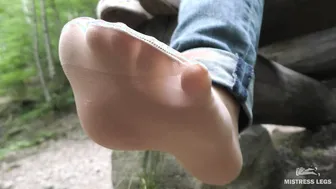 Jeans Foot inside Nylon Socks inside the Forest
