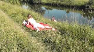 Riverside Nude Cougar Sunbathing Is Not Shy About Random Fisher