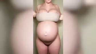 Pregnant trying on lingerie