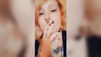 chick with Fat Lips Smokes a Cigar