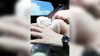 Pumping my gigantic milk breasts empty inside the vehicle