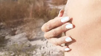 Tanned Nudist 18 Yo Receives a Spit on her Tight Asshole before taking a hot Piss on the Beach