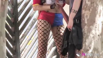 Harley Quinn cosplayer seduces and sucks men into the street