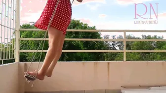 Adorable housewife has fun without underwear on the swing. Hoe swings and