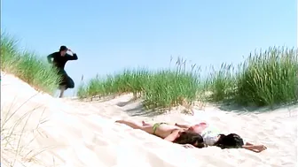 Group sex on a German beach upscaled to 4K