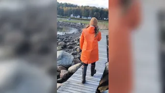 Taking a Stroll inside Orange Raincoat and Latex Boots