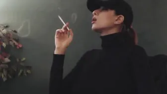 Smoking 120 wearing sweater