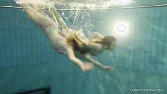 Blonde and dark hair Duna and Nastya underwater cuties