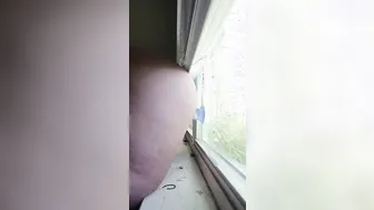 Slutty cougar Plays inside Front of Window 