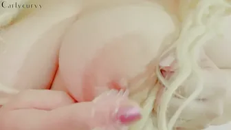 Clitoris and Breasts Pose with a Sex Toy
