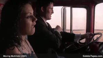 Mila Kunis shows cleavage
