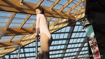 Roxalana Cheh wearing pink dress inside the pool