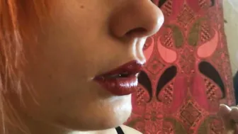 Red Head smoking close up