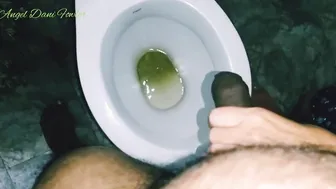 Skank Holding Dick into Restroom Watches Man Peeing