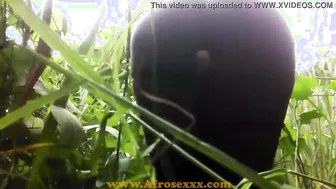 native Black sex toy masturbating inside the jungle