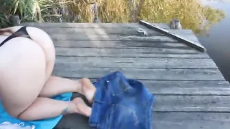 A dude fucks a chick with huge boobs into nature