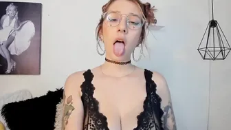 Otaku red haired inside glasses doing an ahegao and drools so
