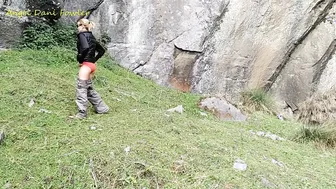 Blonde Hoe Pee Outdoors near Waterfall