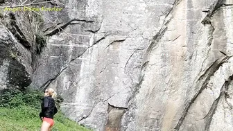 Blonde Hoe Pee Outdoors near Waterfall