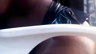 Ebony with Mini Skirt Fucks herself with a Dildo on the Chair