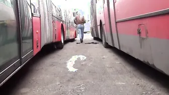sexy Blonde Pees between 2 Buses