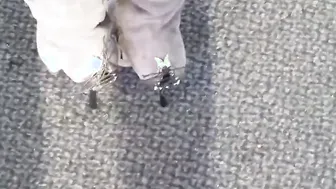Walking into mediamark with high heel shoes louboutin and blue