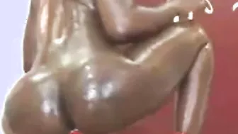 Black cunt with mouth with a heartshaped buttplug