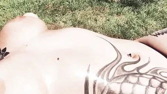 Bombshell Tattooed sluts Having Fun with her Huge Boobies next to the Pool