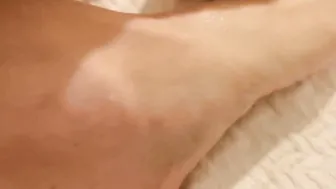 Aoife Massages her Toes after a Long Day