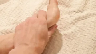 Aoife Massages her Toes after a Long Day
