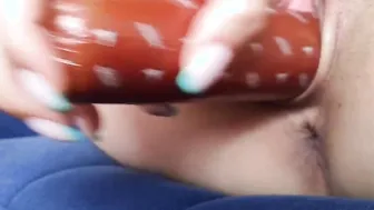 chick fucks herself with a sausage