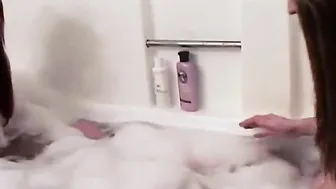Crazy Bombshell twins masturbate into the hot tub