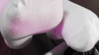 Warm-up inside Sneakers and White Socks Showing Off